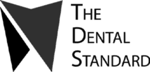 black abstract tooth icon with the dental standard text next to it